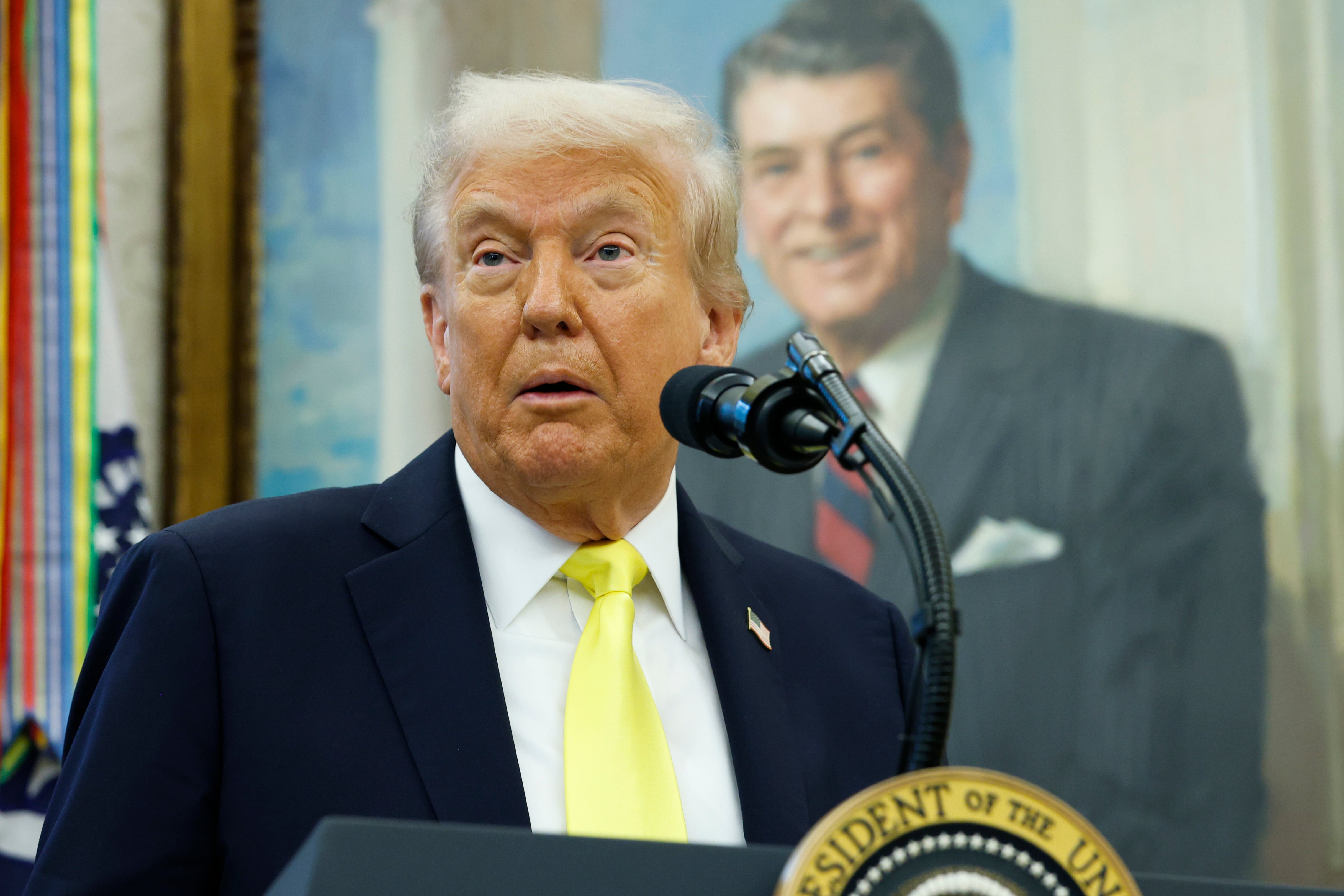 Donald Trump speaking at a press conference