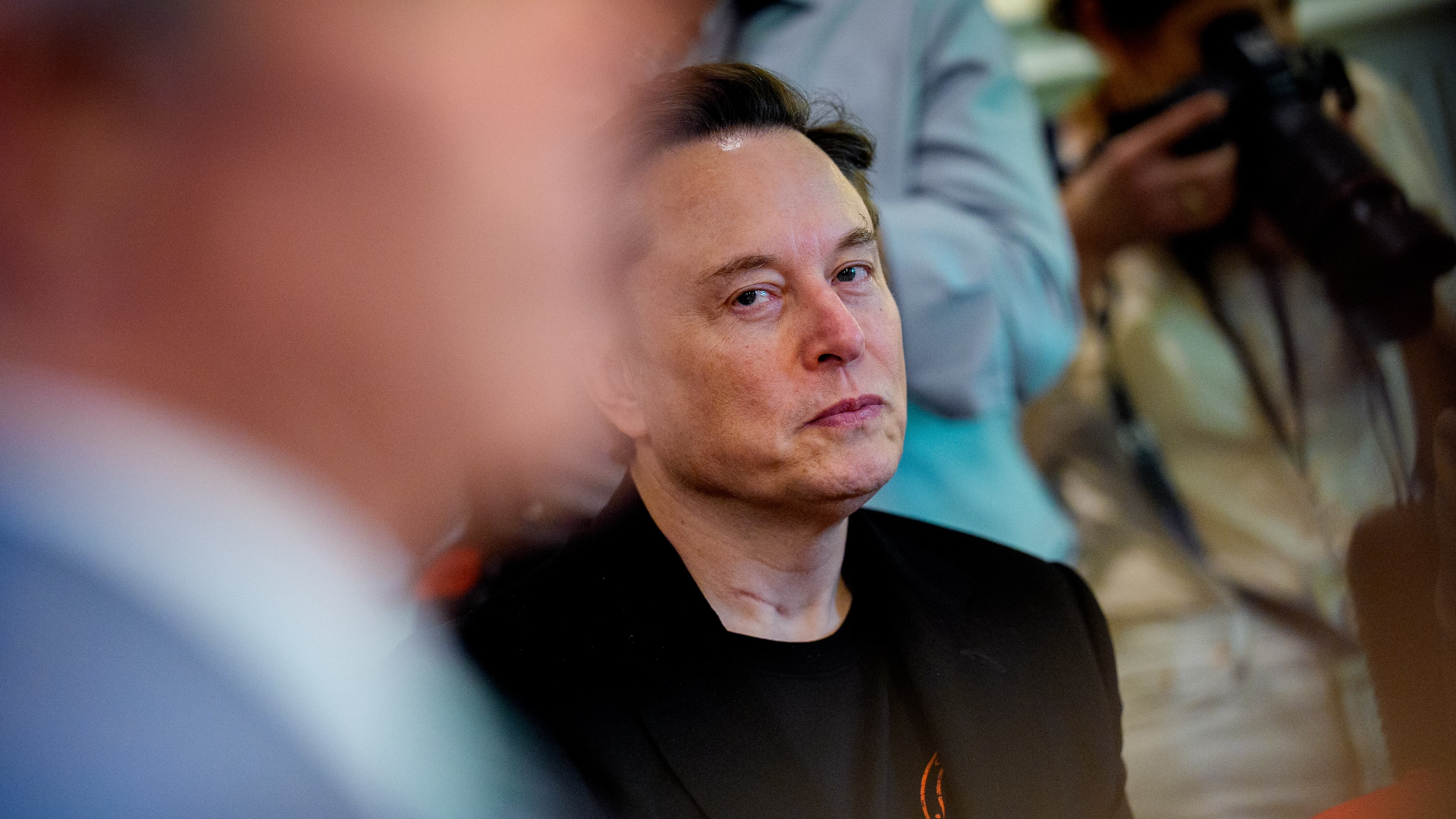 WASHINGTON, DC - APRIL 30: Tesla CEO Elon Musk looks on during a Cabinet meeting at the White House on April 30, 2025 in Washington, DC. Trump convened the meeting as reports released today say the U.S. economy contracted 0.3% in the first quarter of 2025, the first negative reading in three years, fueled by a massive surge in imports ahead of the administration's expected tariffs. (Photo by Andrew Harnik/Getty Images)