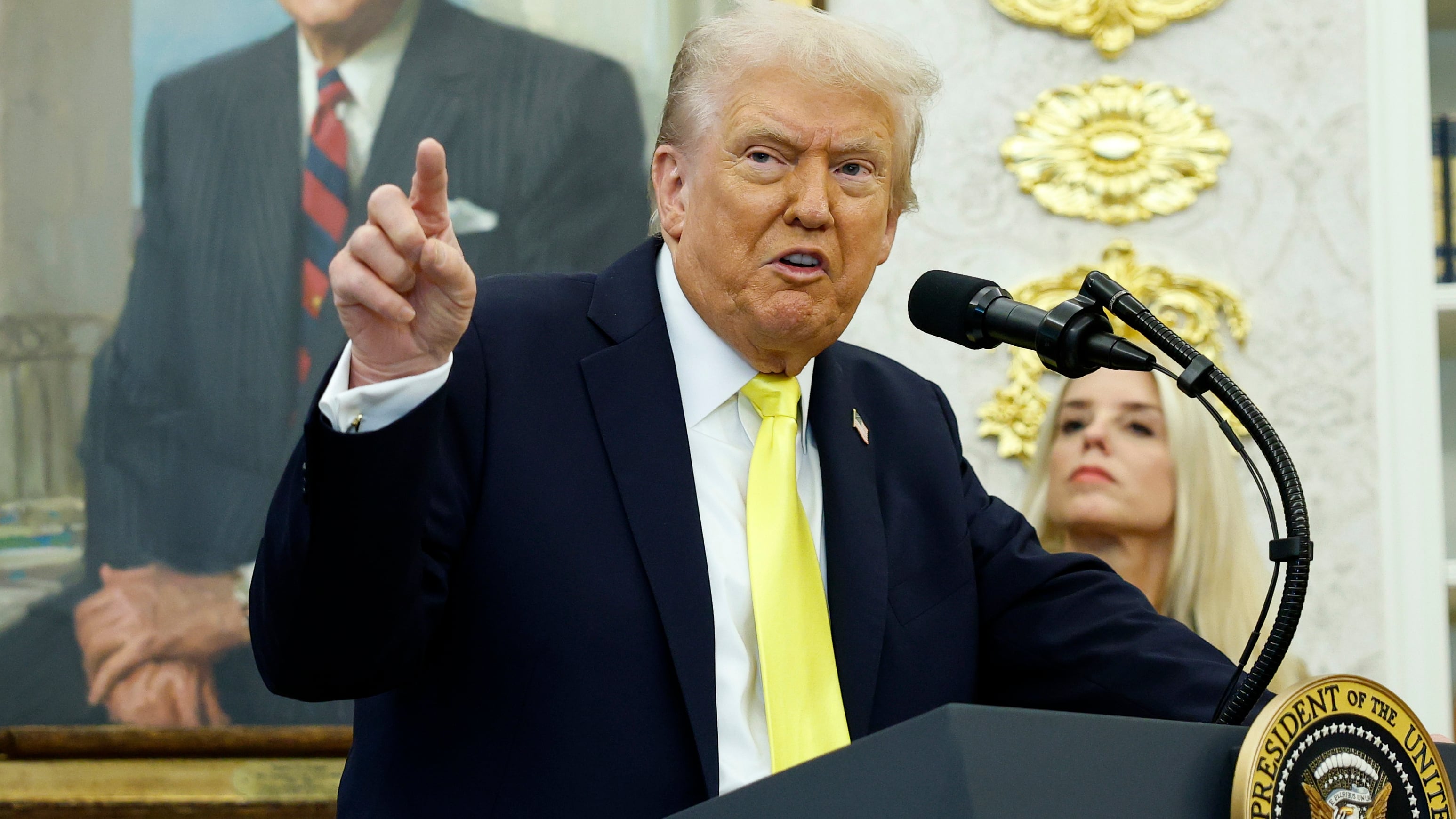 President Donald Trump speaks during a press conference in the Oval Office