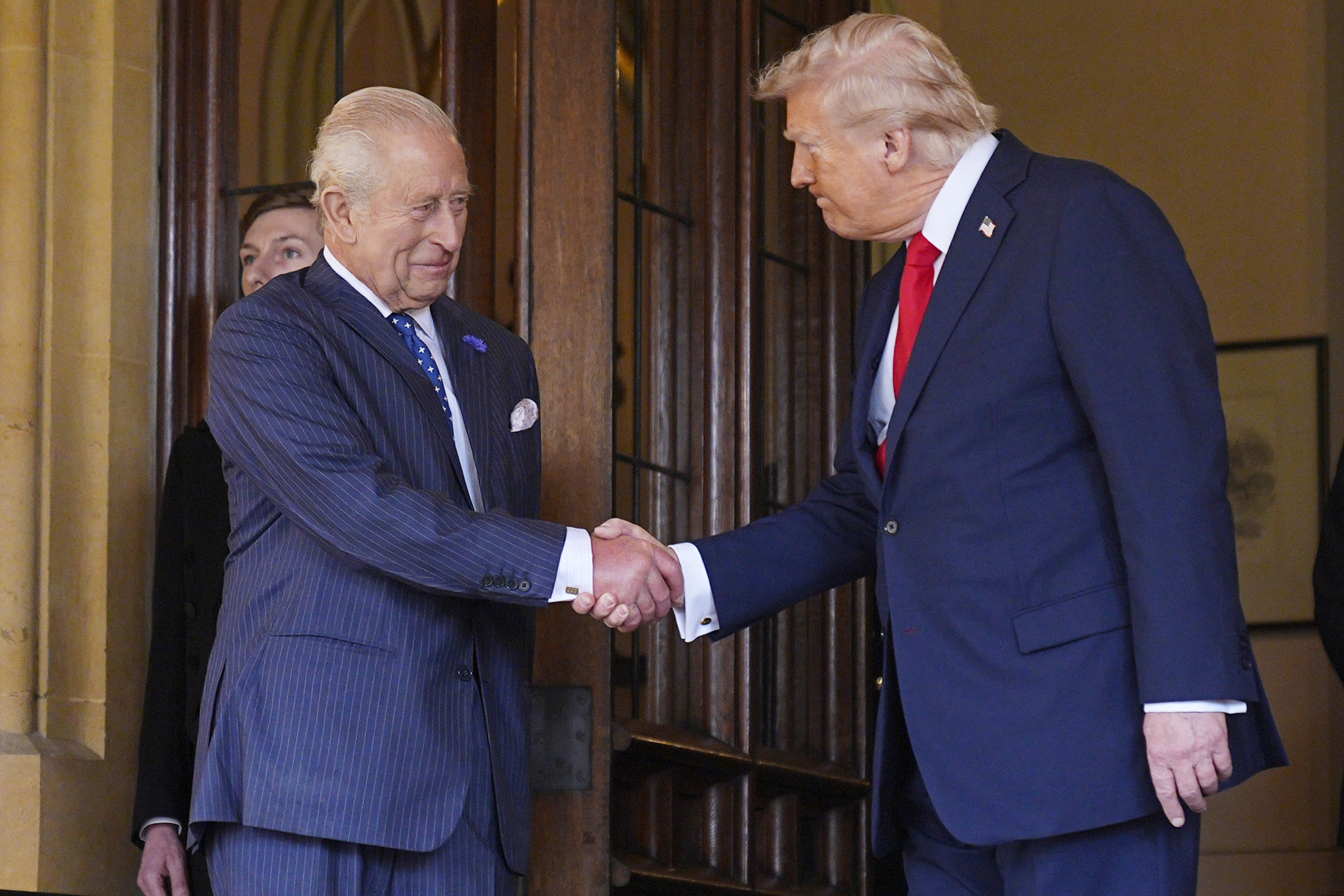 U.S. President Donald Trump bids farewell to King Charles III at Windsor Castle before praising the monarch. / Anna Moneymaker / Anna Moneymaker/Getty Images