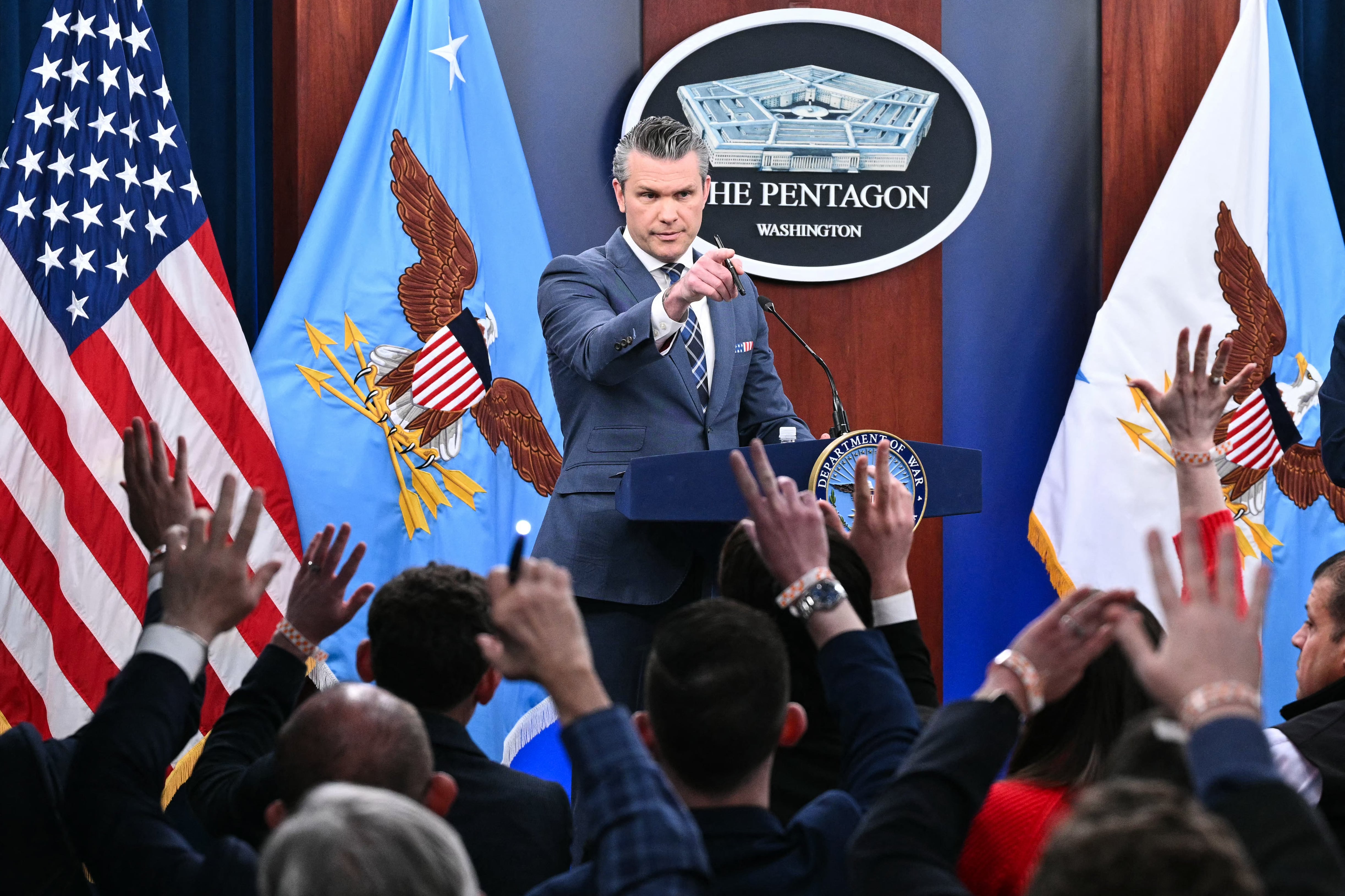 Secretary of Defense Pete Hegseth speaks during a news conference at the Pentagon in Washington, DC, on March 19, 2026. / Mandel Ngan/AFP via Getty Images