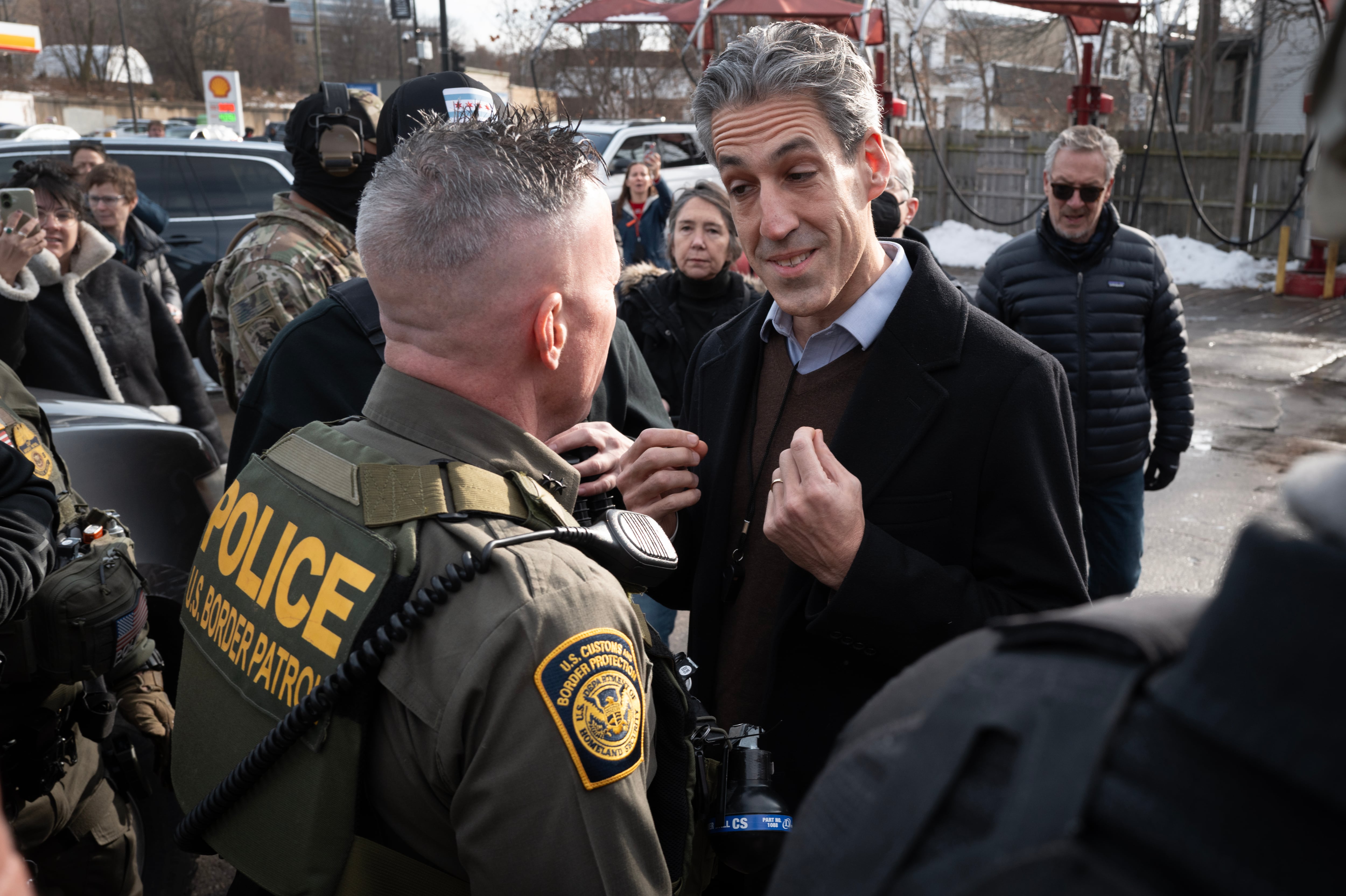 At one point Biss demanded that Bovino, who had moved in close to the Evanston mayor, to take a step back, which Bovino did. / Scott Olson/Getty Images